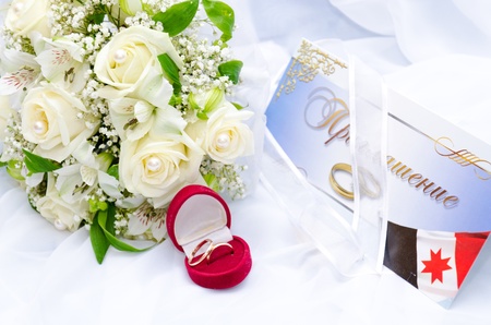 wedding rings and roses bouquetの写真素材