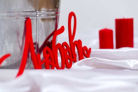 Valentine's Day candles with red words on fabricの写真素材