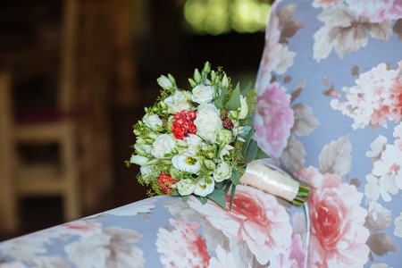 Beautiful wedding colorful bouquet for bride. Beauty of colored flowers. Close-up bunch of florets. Bridal accessories. Female decoration for girl. Details for marriage and for married coupleの写真素材