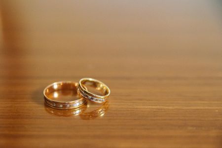 two golden wedding rings in the celebration dayの写真素材
