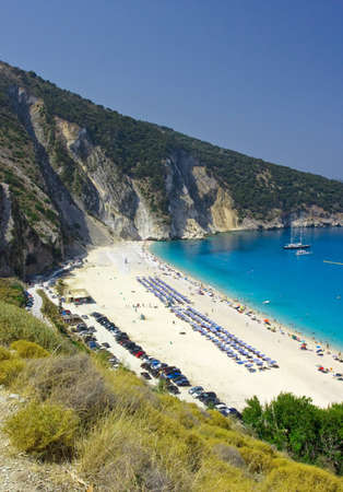 bird's-eye view of Myrtos beach in Kefalonia Greece, in August, populated by vacationersの写真素材