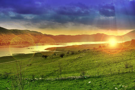 natural landscape in HDR, with reflections of the sunの写真素材