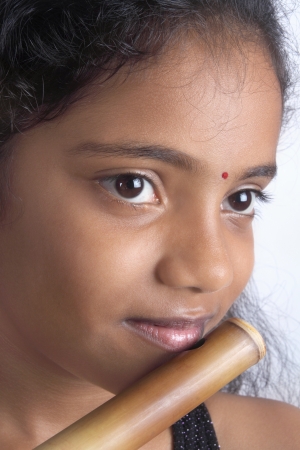 Indian Teenage Girl With Fluteの写真素材