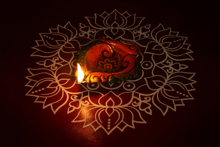 Indian Traditional kolam with Oil Lampの写真素材