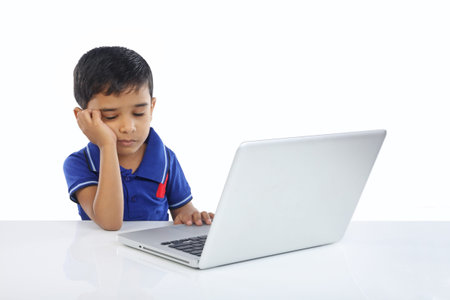 Indian Little Boy With Laptop