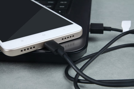 Laptop with mobile phone