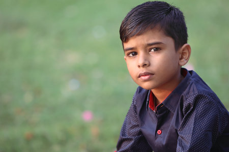 Portrait of Indian Little Boy Posing to Camera with Expression