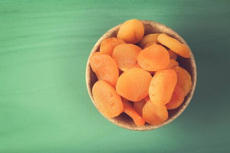 Dried apricots in the bowlの写真素材