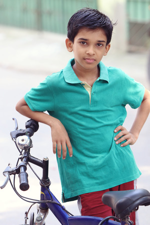 Indian Cute Boy with Cycleの写真素材