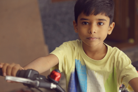 Indian Little Boy with Cycleの写真素材