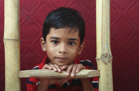 Portrait of Indian Little boy Posing to Camera with Cute Expressionの写真素材