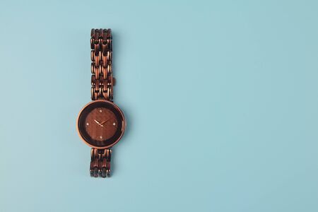 Girl's classic wrist watch on white backgroundの写真素材