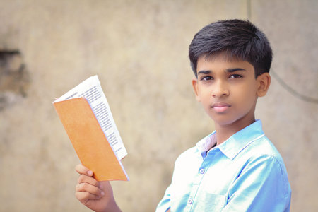 Portrait of Indian little school boy posing to cameraの写真素材