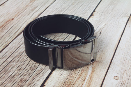 Indian Made Leather Waist Belts with Adjustable Buckle on Wooden Table