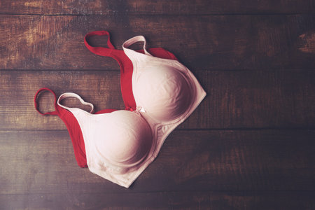 Woman's Bra Isolated on wooden tableの写真素材