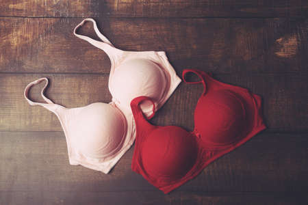 Woman's Bra Isolated on wooden tableの写真素材