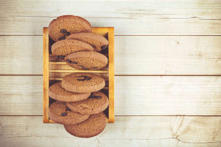 Homemade Chocolate Chip Cookies on wooden tableの写真素材