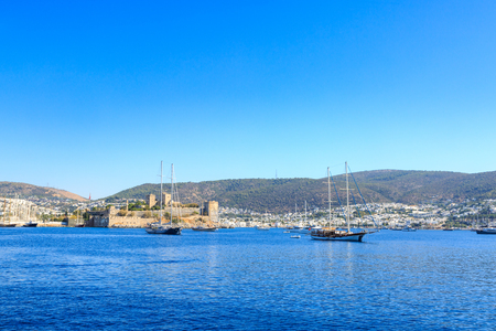 Bodrum castle from sea with boats in Bodrum, Turkeyのeditorial素材