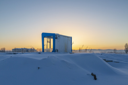 Bus stop in snow during sunset in Erzurum, Turkeyの写真素材