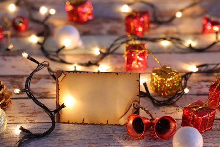 Greeting card for new year or christmas with Christmas lights and decorations