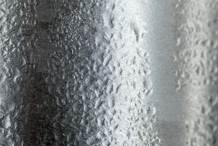 water drops an metallic backgroundの写真素材