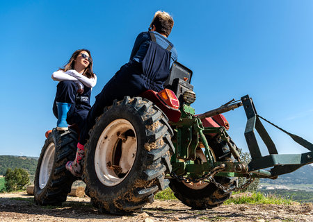 02,24,2021, Foca, Izmir, Turkey, women resting and chatting on the tractor