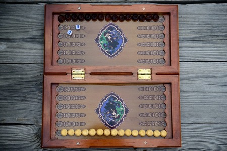 Color detail of a Backgammon game with two dice close up.のeditorial素材