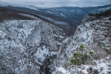 View of the snow-covered winter canyonの写真素材