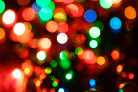 Multicolored highlights, New Year's background from a garland without focusの写真素材