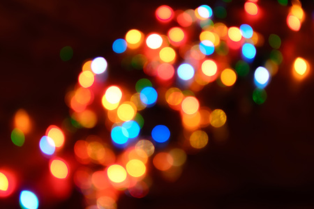 Multicolored highlights, New Year's background from a garland without focusの写真素材