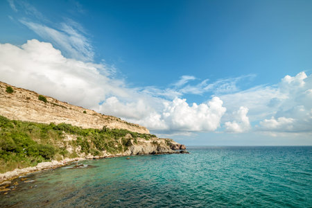 Rocky sea shore on a hot summer day