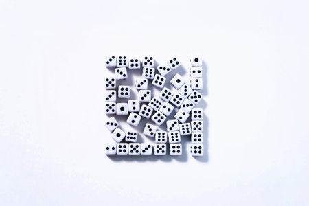 Dice on a white background stacked in a square