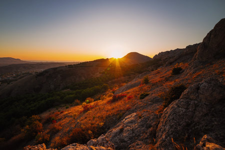 Beautiful golden sunset in the autumn in the mountains