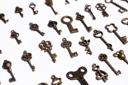 Group of diverse keys on a white background, home conceptの写真素材