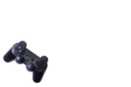 Black joystick on a white background, gaming entertainment conceptの写真素材