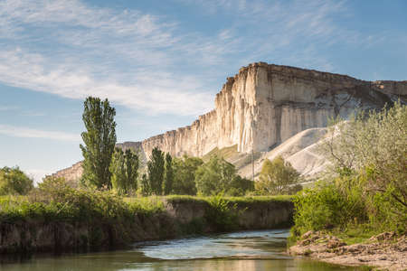 Small mountain river against the background of the White Rock, summer beautiful landscape, panorama, Belogorsk, Crimea, Russiaの写真素材