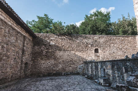 Ancient stone laying of an old destroyed building, decorative backgroundの写真素材