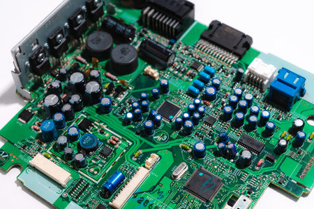 Heap of old soviet microcircuits on a white background, the concept of techno-junk, garbage,...