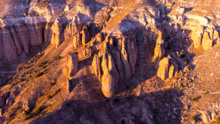 Colourful Mountains. Red and Pink Valley At Sunset. Tourist Attractions Goreme, Cappadocia, Turkey.の写真素材