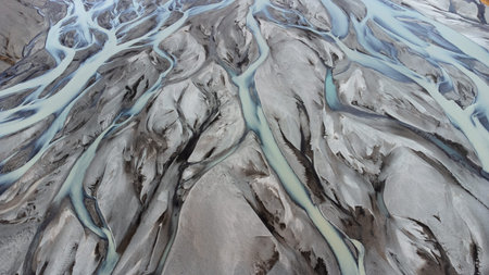 Glacial rivers from above. Aerial photograph of the river streams from Icelandic glaciers. Beautiful...