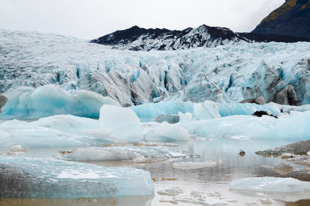 Glacier in Iceland, Pure Blue Ice at Winter Season, Frozen Beautiful Nature Landscape in North Europe Country. Global Warming and Climate Change Concept. Vatnajokull Glacierの写真素材