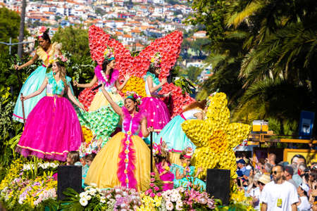 Funchal, Madeira - May 8, 2022: The famous Flower Festival (Festa da flor) in Madeira. The flower parade in Funchal.のeditorial素材