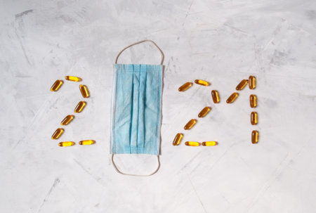 2021 christmas and happy new year flatlay. Design template. Concept of celebrating in the healthcare...