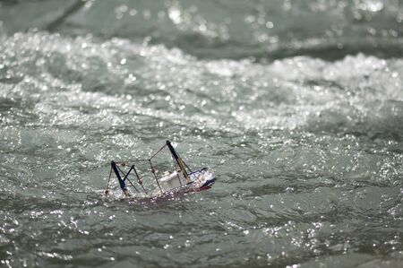 Fishing ship fighting the stormの写真素材