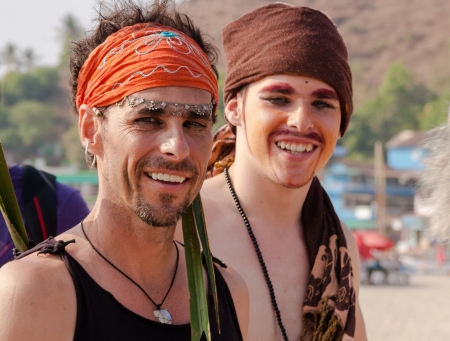 Two unidentified young a man in carnival costumes at the annual festival of Freaks, Arambol beach, Goa, India, February 5, 2013  Tourists put on crazy homemade costumes and show funny performances on the beach のeditorial素材
