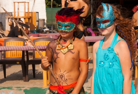   Arambol, Goa - February 5, 2013   Girl and boy in carnival costumes at the annual festival, Arambol beach, Goa, India, February 5, 2013 のeditorial素材