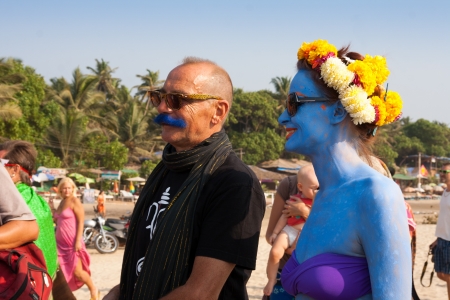 Arambol, Goa - February 5, 2013   A woman with blue skin and a man with a blue mustache at the annual festival of Freaks, Arambol beach, Goa, India, February 5, 2013のeditorial素材