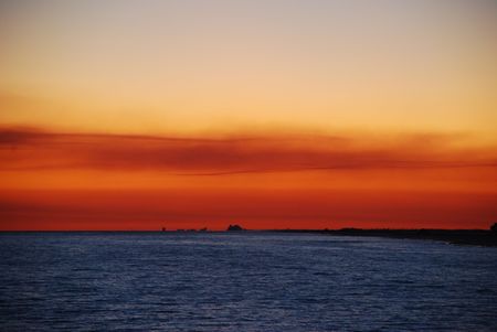 Dramatic sunset over lakeの写真素材