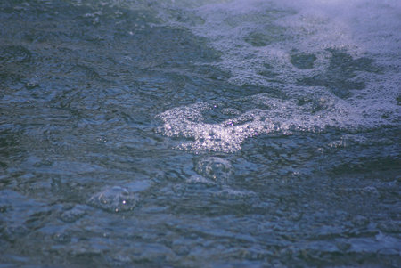 Bubbles on top of swirling water