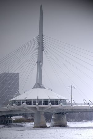 Center pavilion and spire of Provencher Bridge and walkway in Winnipegのeditorial素材